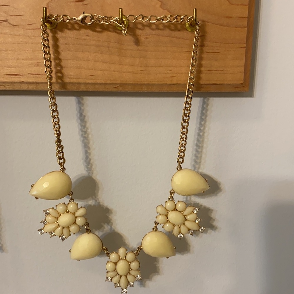 Gold and cream jeweled necklace